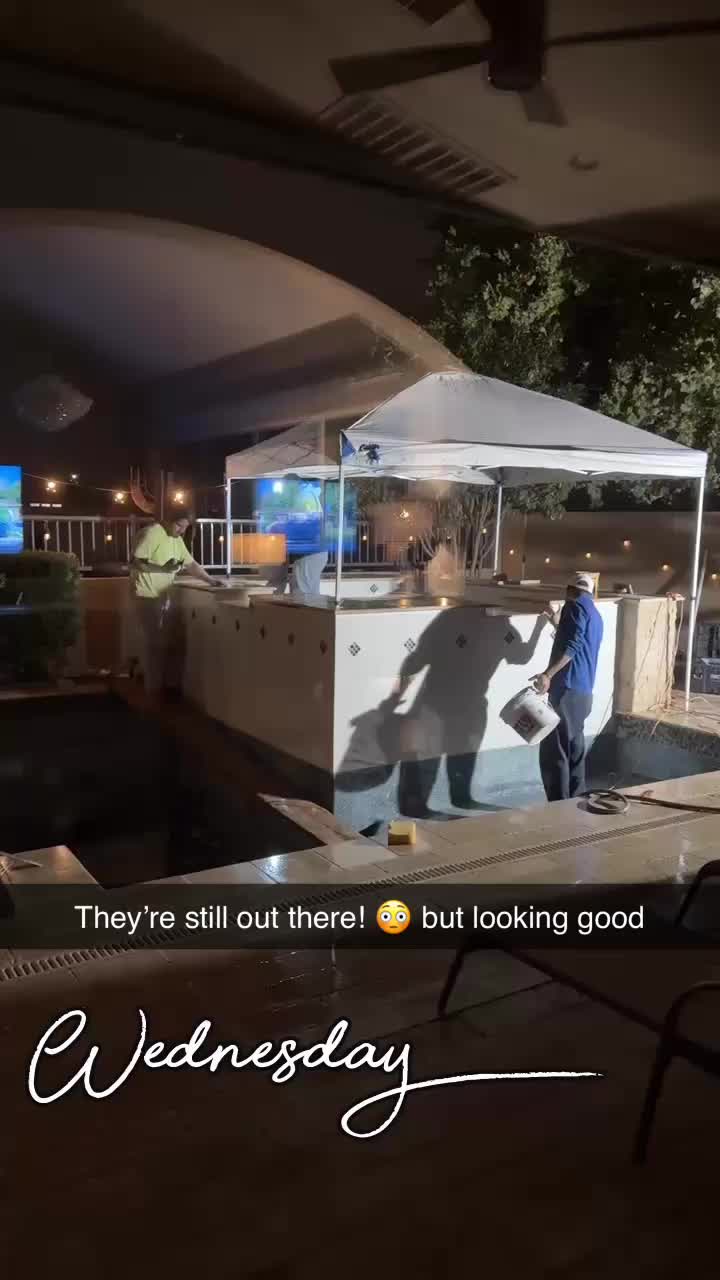 Poor guys working hard in the rain to get our spa reno done! 